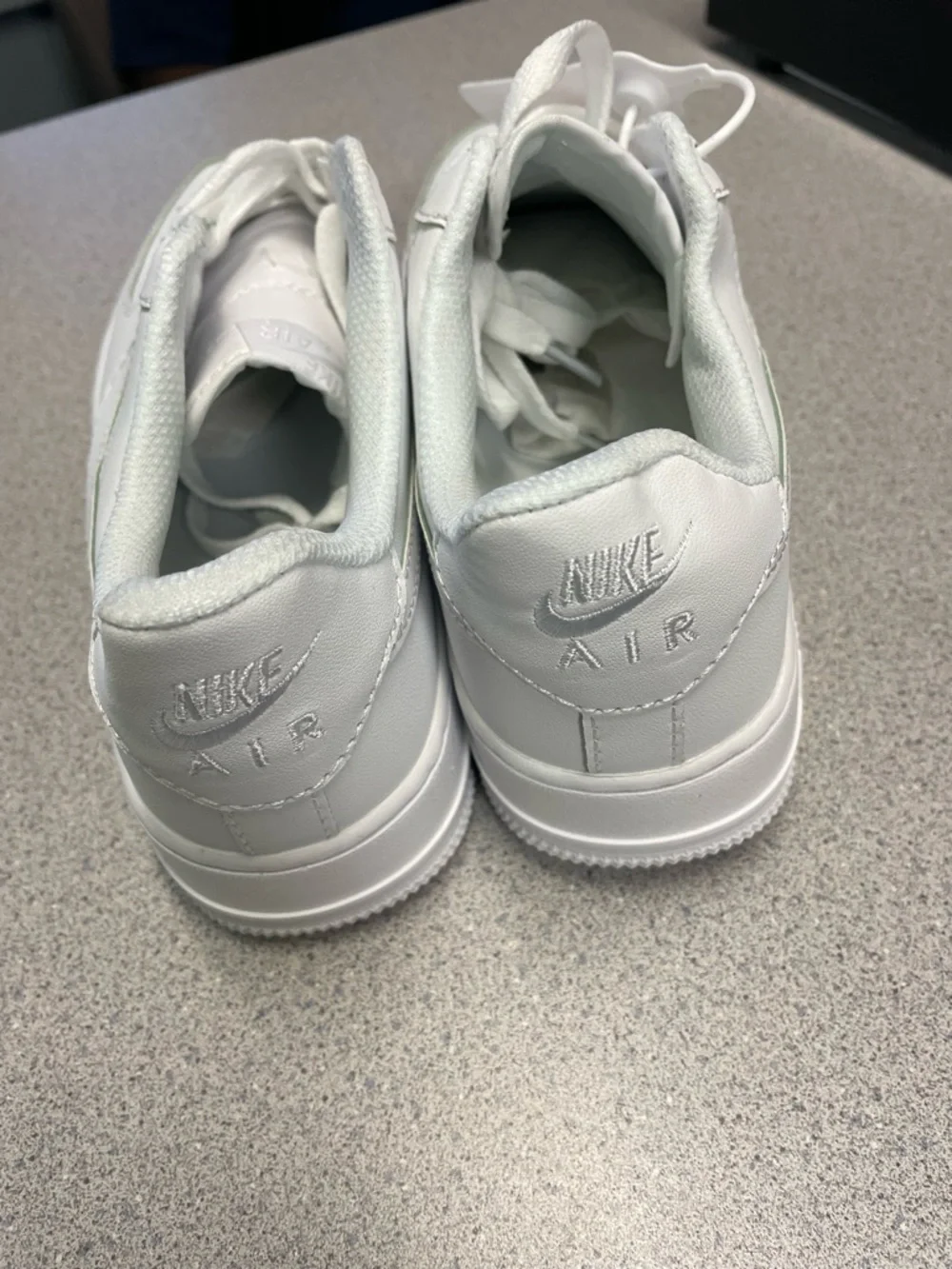 Nike All-White Leather Low-Top Sneakers
